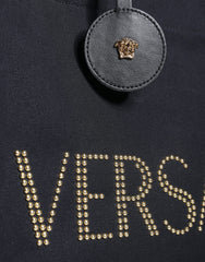 Bolsa transversal Versace preta com alça superior em couro e lona com logotipo