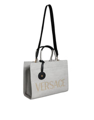 Bolsa transversal Versace branca com alça superior em couro e lona com logotipo