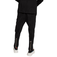 Calças Alexander McQueen com pregas frontais