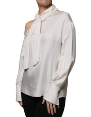 Blusa Brunello Cucinelli de seda bege com gola Ascot e mangas compridas