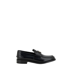 Mocassins Prada de couro preto com logotipo