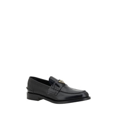 Mocassins Prada de couro preto com logotipo