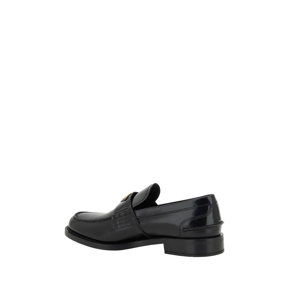 Mocassins Prada de couro preto com logotipo