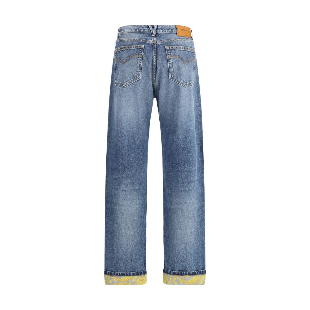 Calça jeans Versace Barocco com barra dobrada