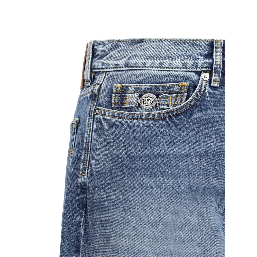 Calça jeans Versace Barocco com barra dobrada