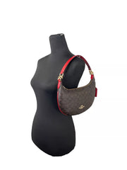 Bolsa de ombro Coach Payton Signature em couro PVC marrom e vermelha