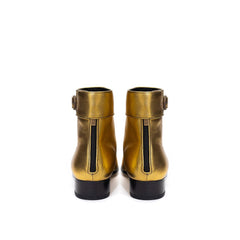 Bota de couro dourada Saint Laurent