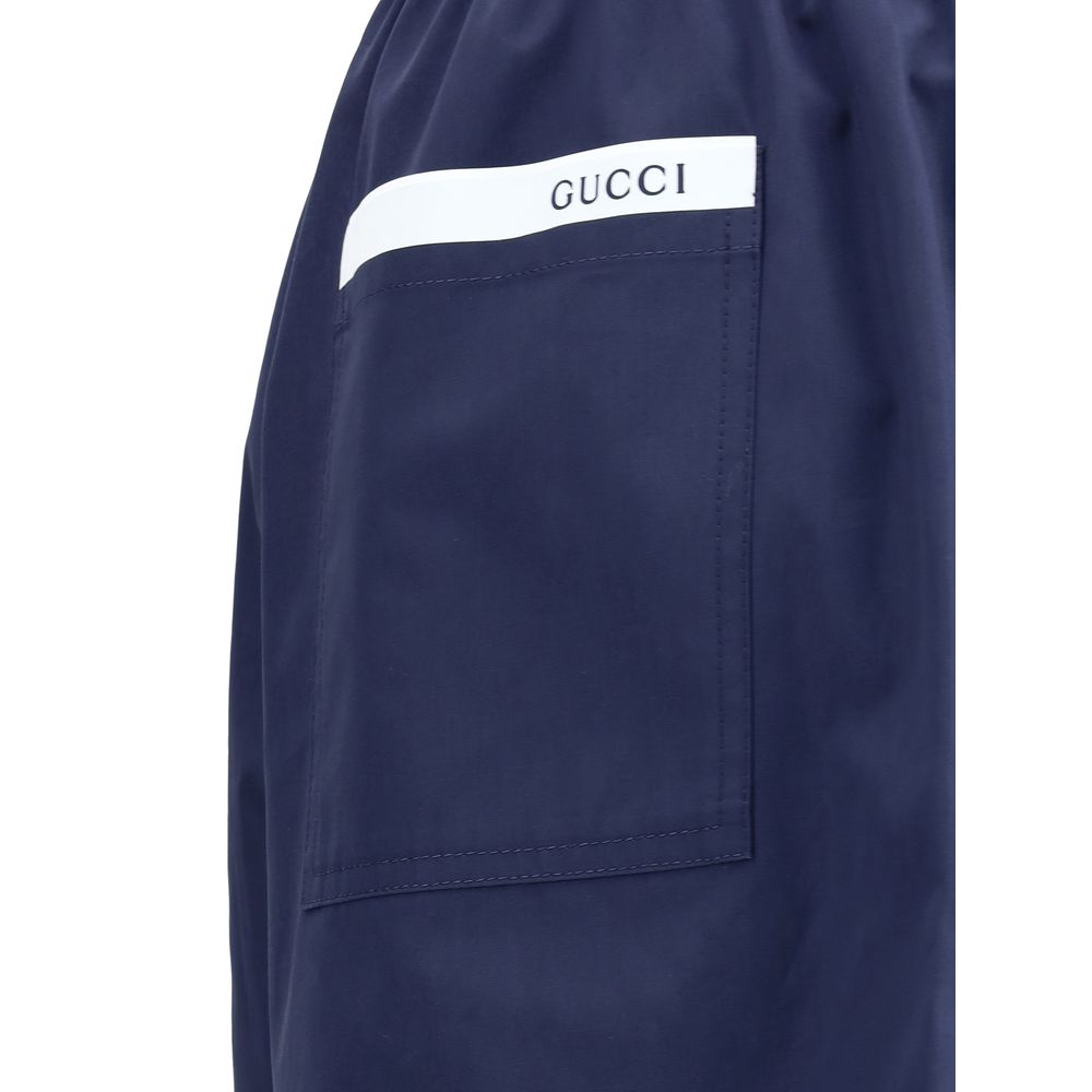 Shorts com logotipo da Gucci