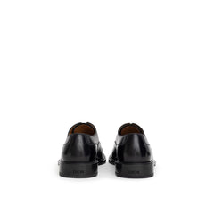 Oxfords e Derby de couro preto Dior