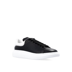 Tênis oversized Alexander McQueen com tachas
