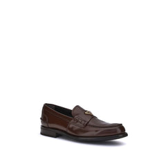 Mocassins Prada com placa triangular