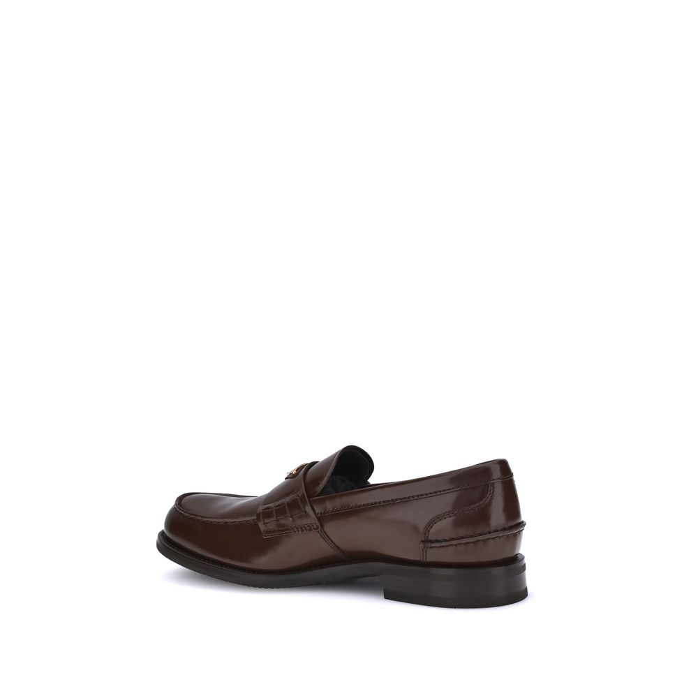Mocassins Prada com placa triangular