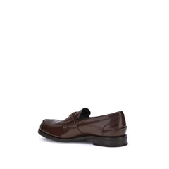 Mocassins Prada com placa triangular